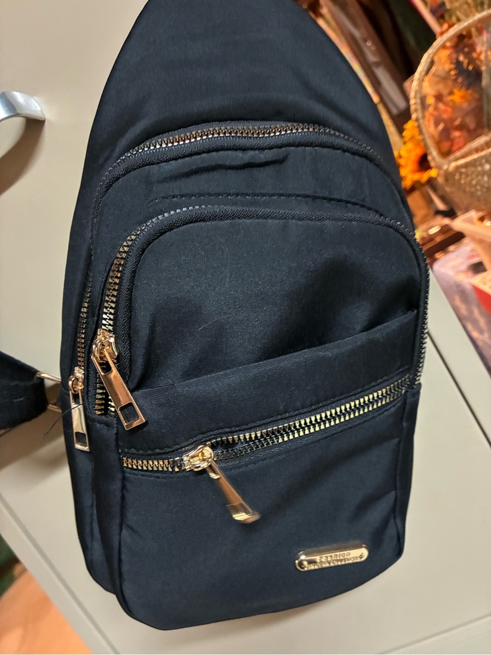 Black Men's Sling Bag with Gold Hardware